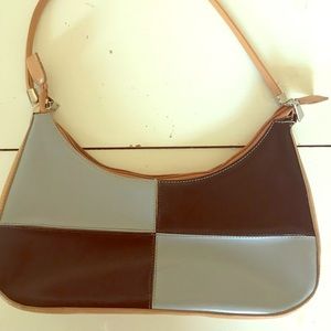 Reversible red/tan and black/gray leather purse